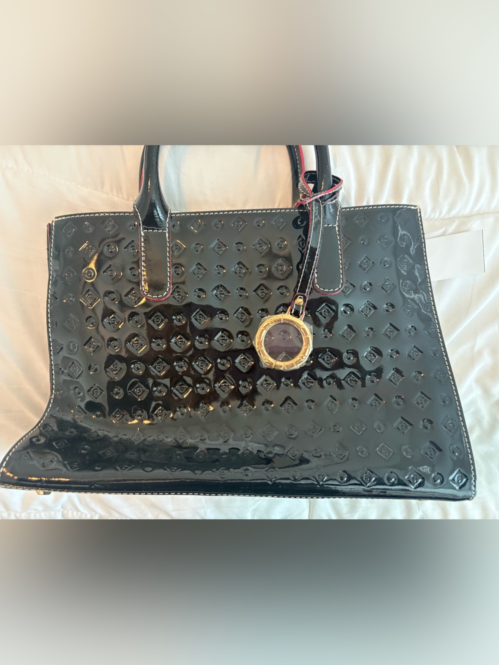 Invece Patent Embossed Tote Bag in Black with Gold Charm